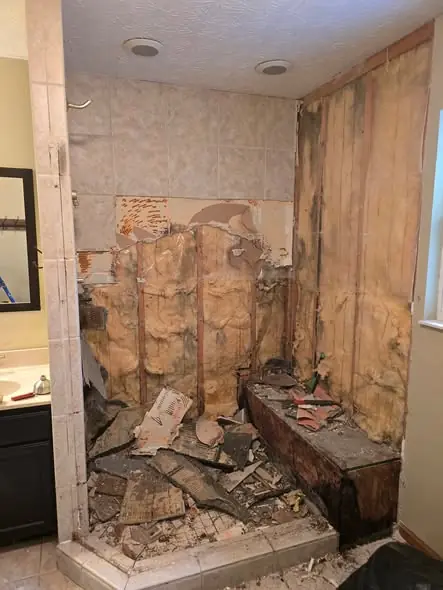 Shower torn out to the framing after water damage